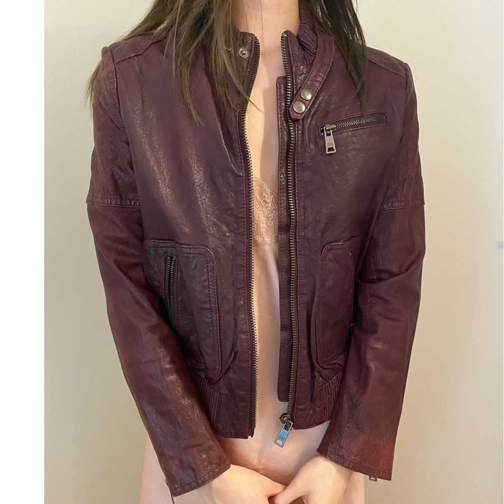 Blue heroes purple leather jacket
